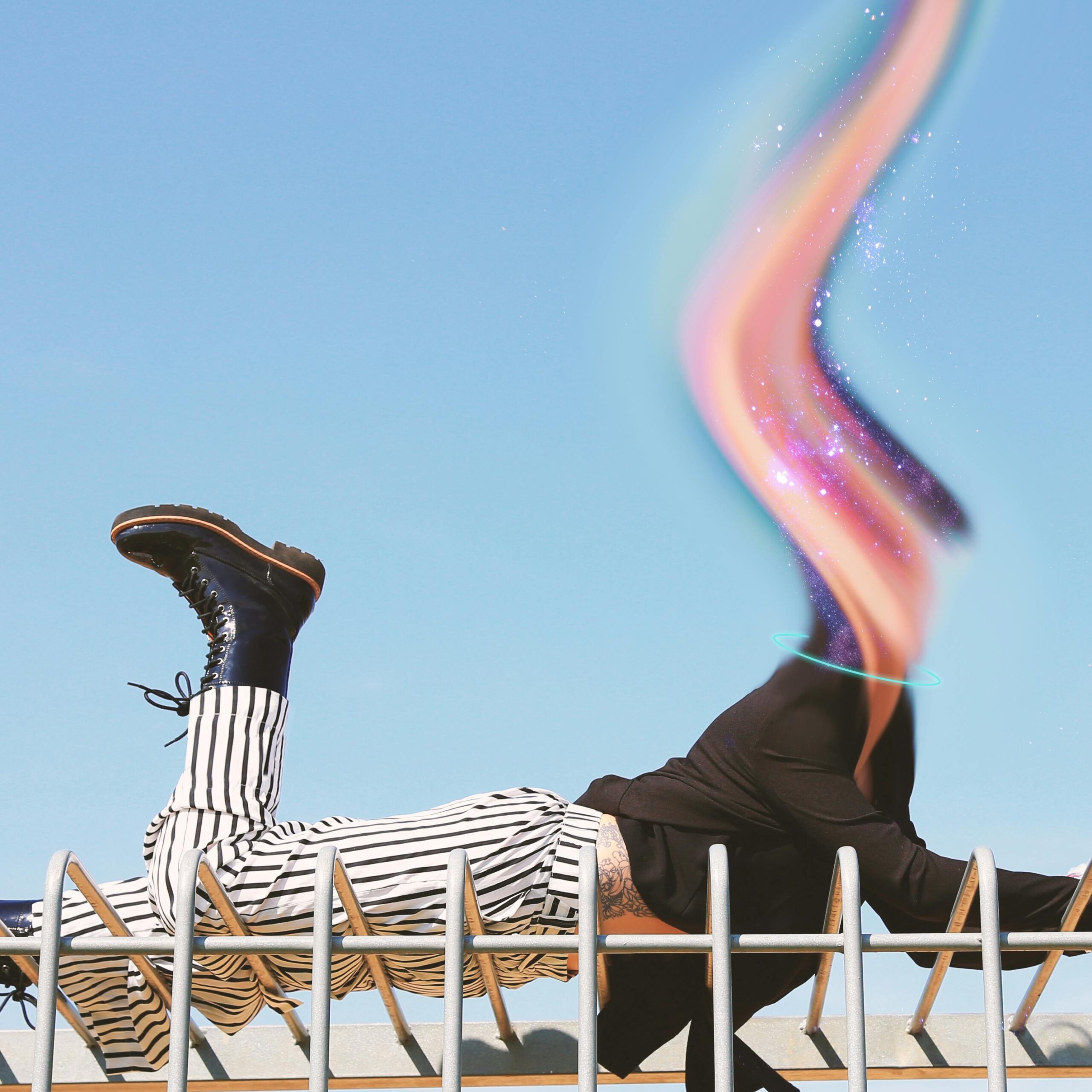 Surreal image of a woman posing with colorful effects in Barcelona.